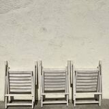 Folding wooden armchairs