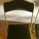 Set of three vintage green folding chairs