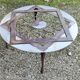 Outdoor iron table with yin yang decoration