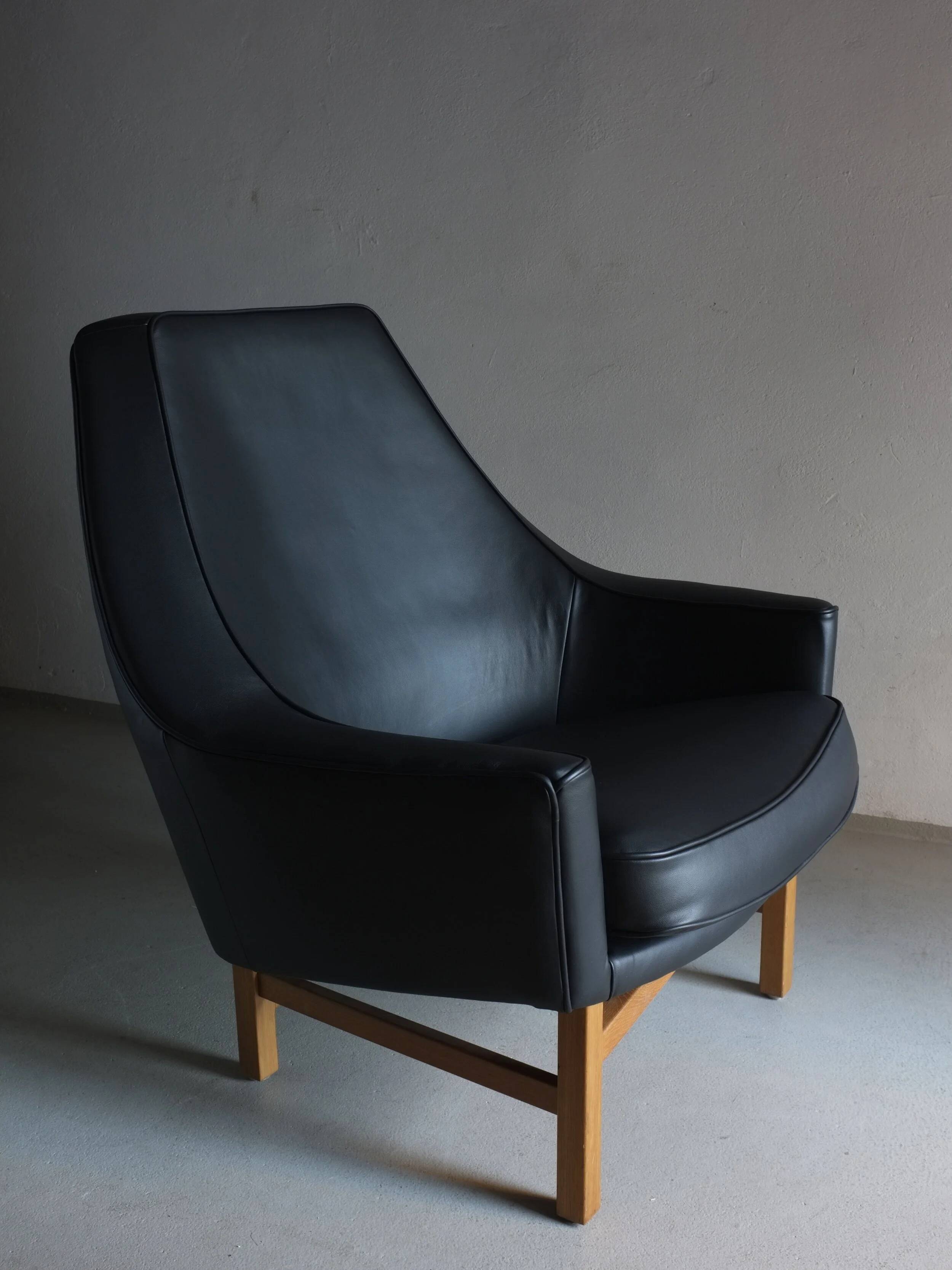 IB Kofod-Larsen leather oak easy chair | OPE Sweden | 1960s