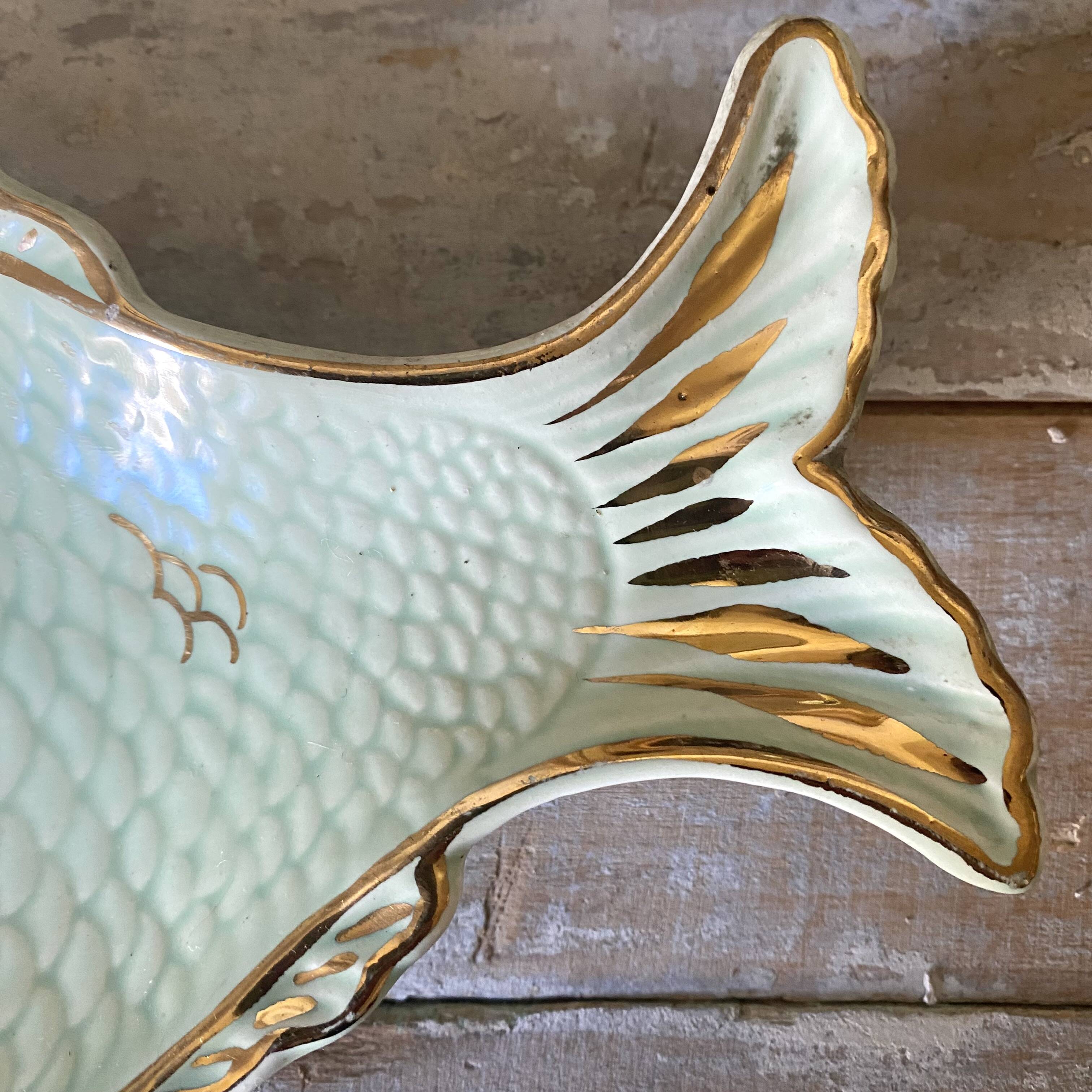 Small fish dish, pocket emptier.