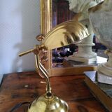 Articulated shell lamp in gold metal
