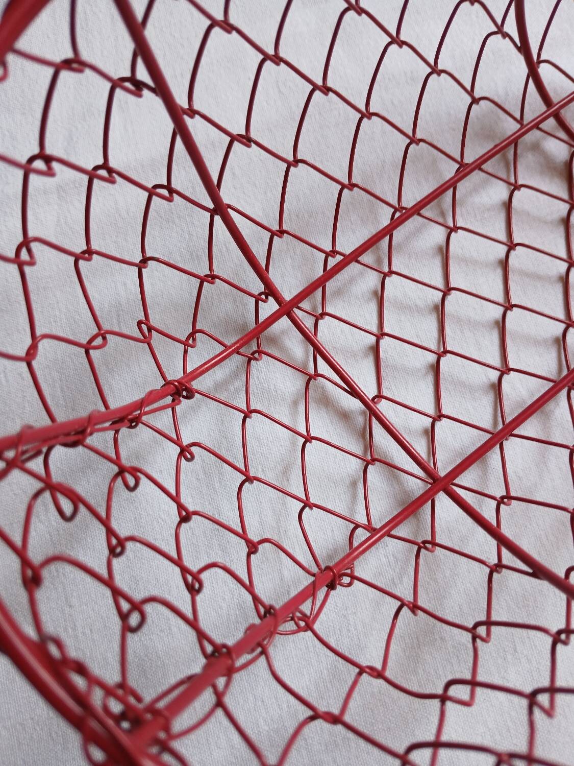 Small red metal basket