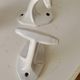 Antique Art Deco wall coat hook in enamelled cast iron.