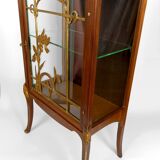 Art Nouveau display case, bronzes and carved wood on a floral theme, circa 1900