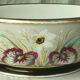 Porcelain jardinière from Paris, Napoleon III period, late 19th century, floral decoration.
