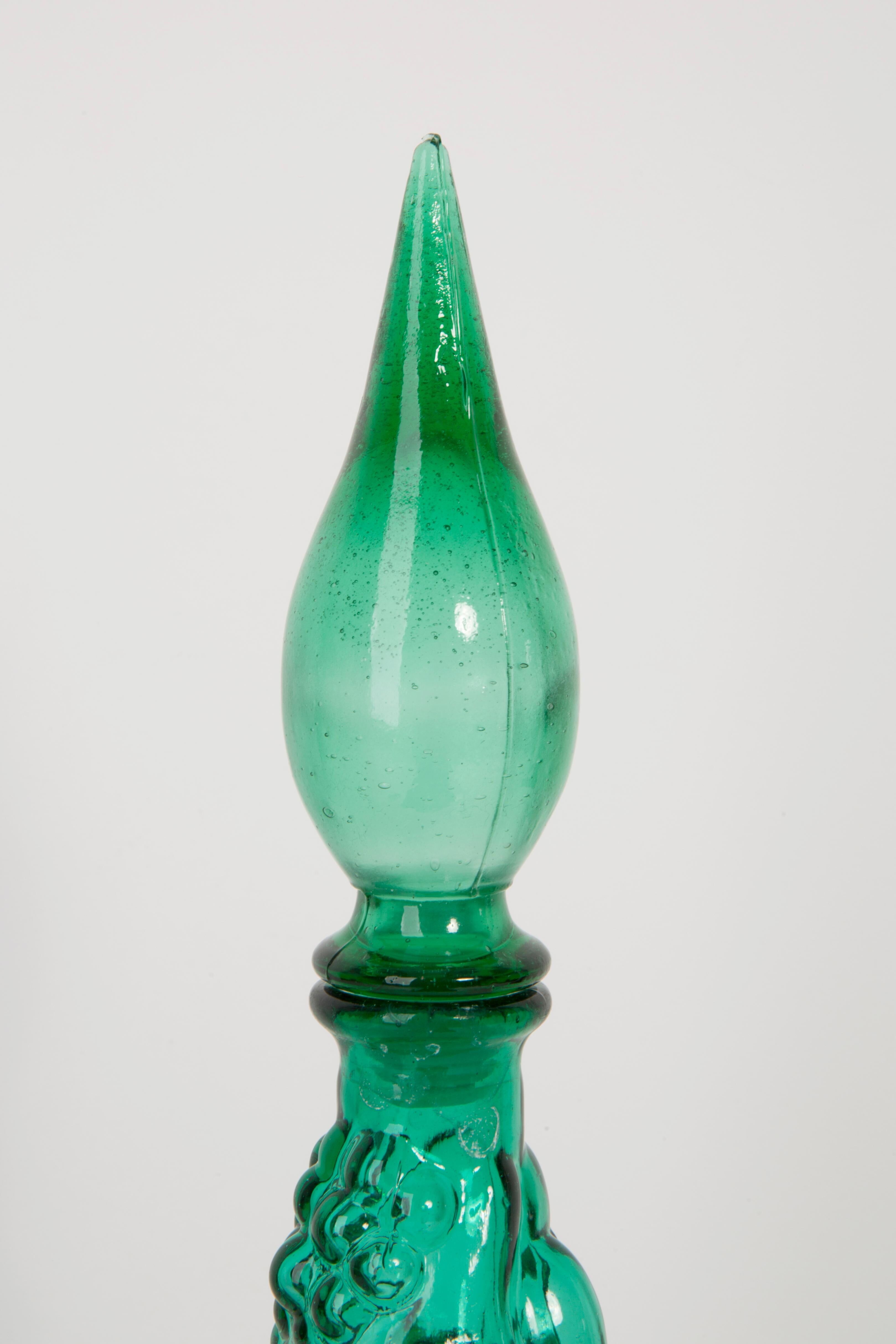 Set of two Genie green glass carafes.