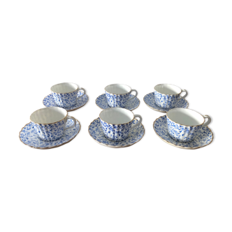Service of antique porcelain coffee cups