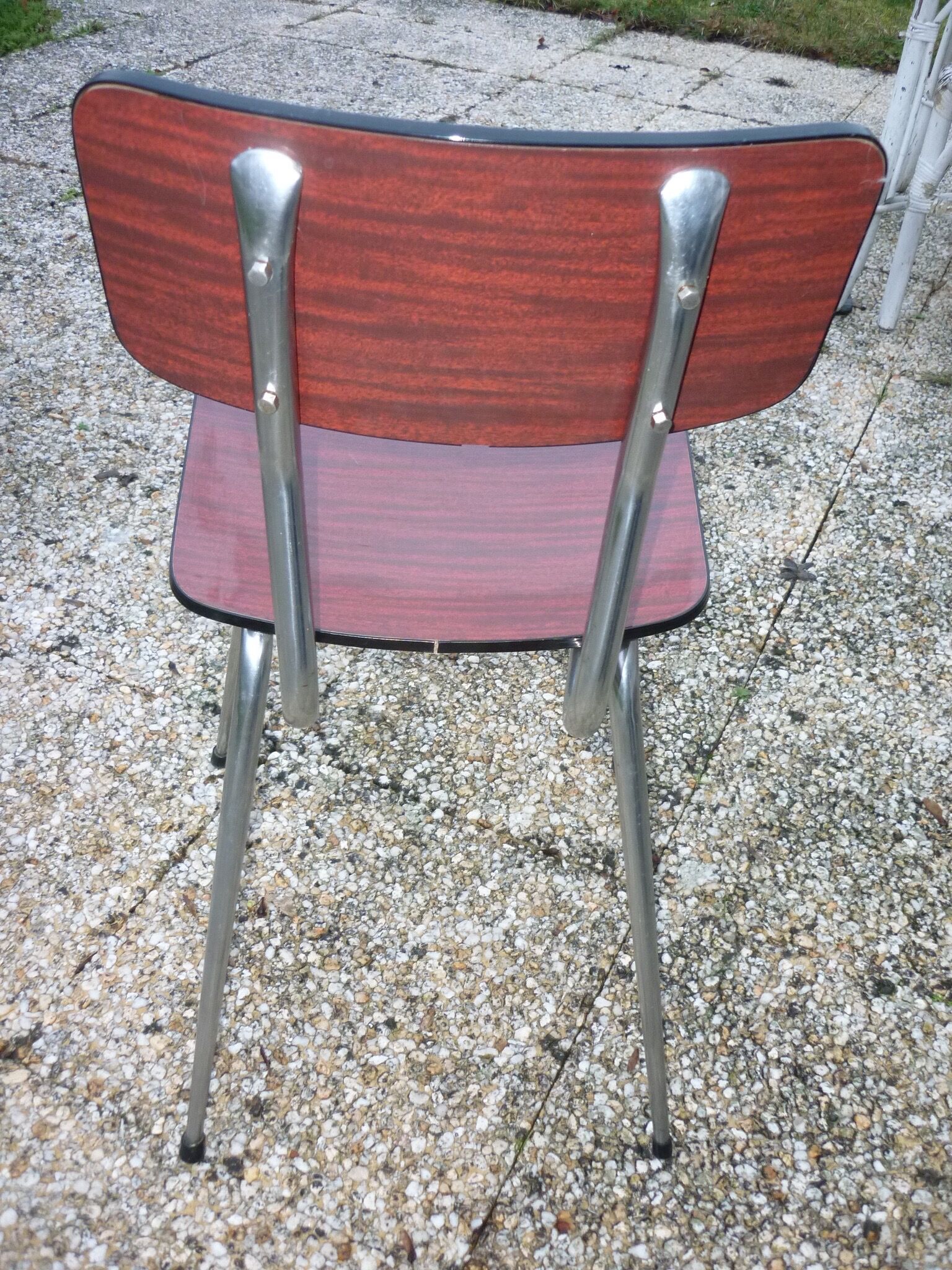 Red-brown marbled formica chair