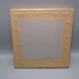 Small old mirror in wood and gilded stucco