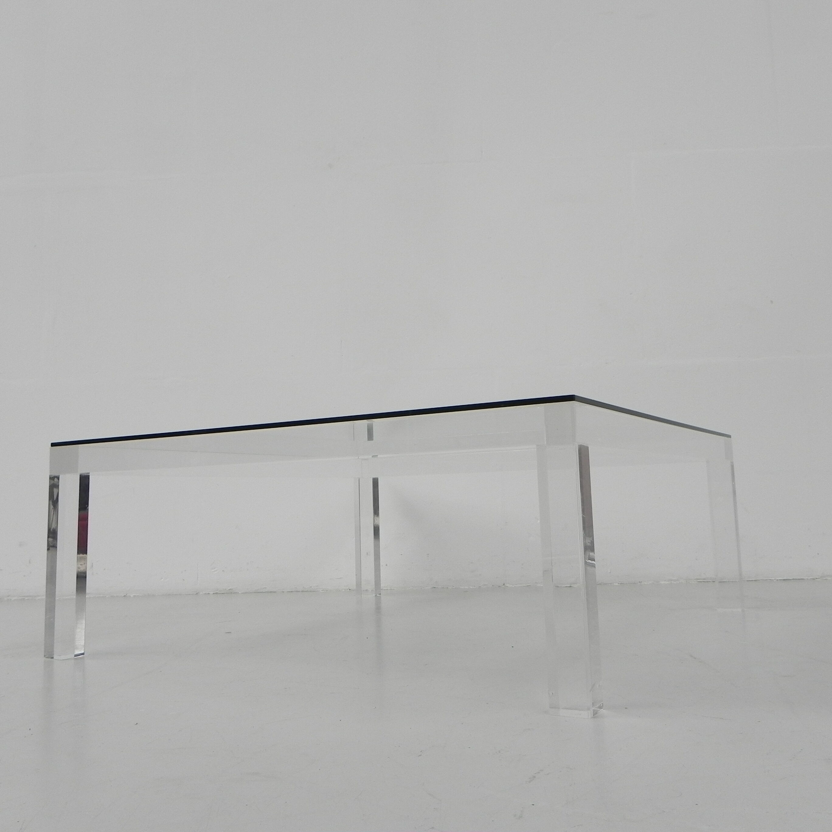 Vintage coffee table on perspex legs