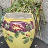 Yellow glazed ceramic slip vase with hawthorn pink flower motif
