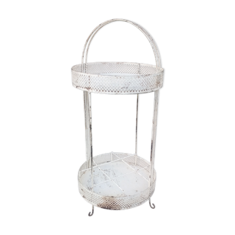 Old-fashioned beverage server made of perforated sheet metal