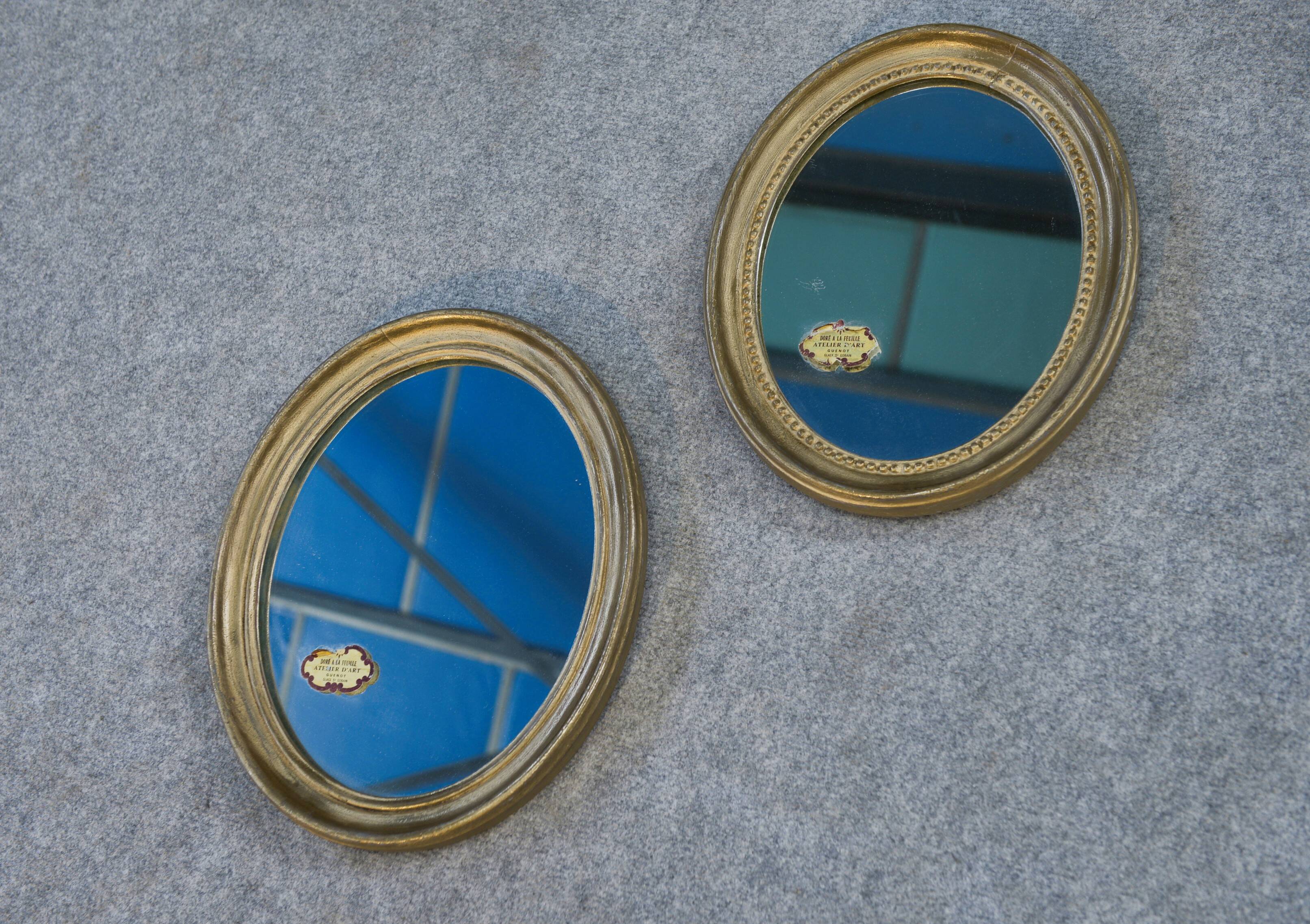 Paire de miroirs ovales, 1950