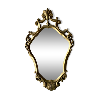 Large golden baroque style mirror