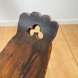 Pair of low tripod chairs in solid wood, mid-20th century.