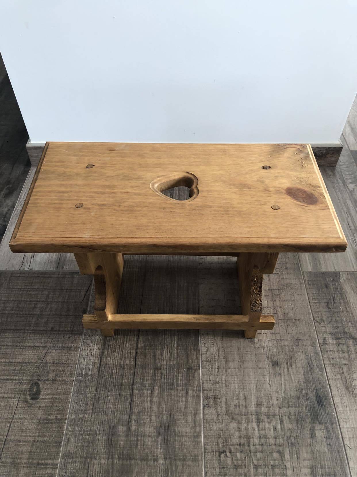 Low rectangular wooden stool