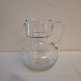 Engraved glass jug with floral decoration – 75 cl – mid 20th century