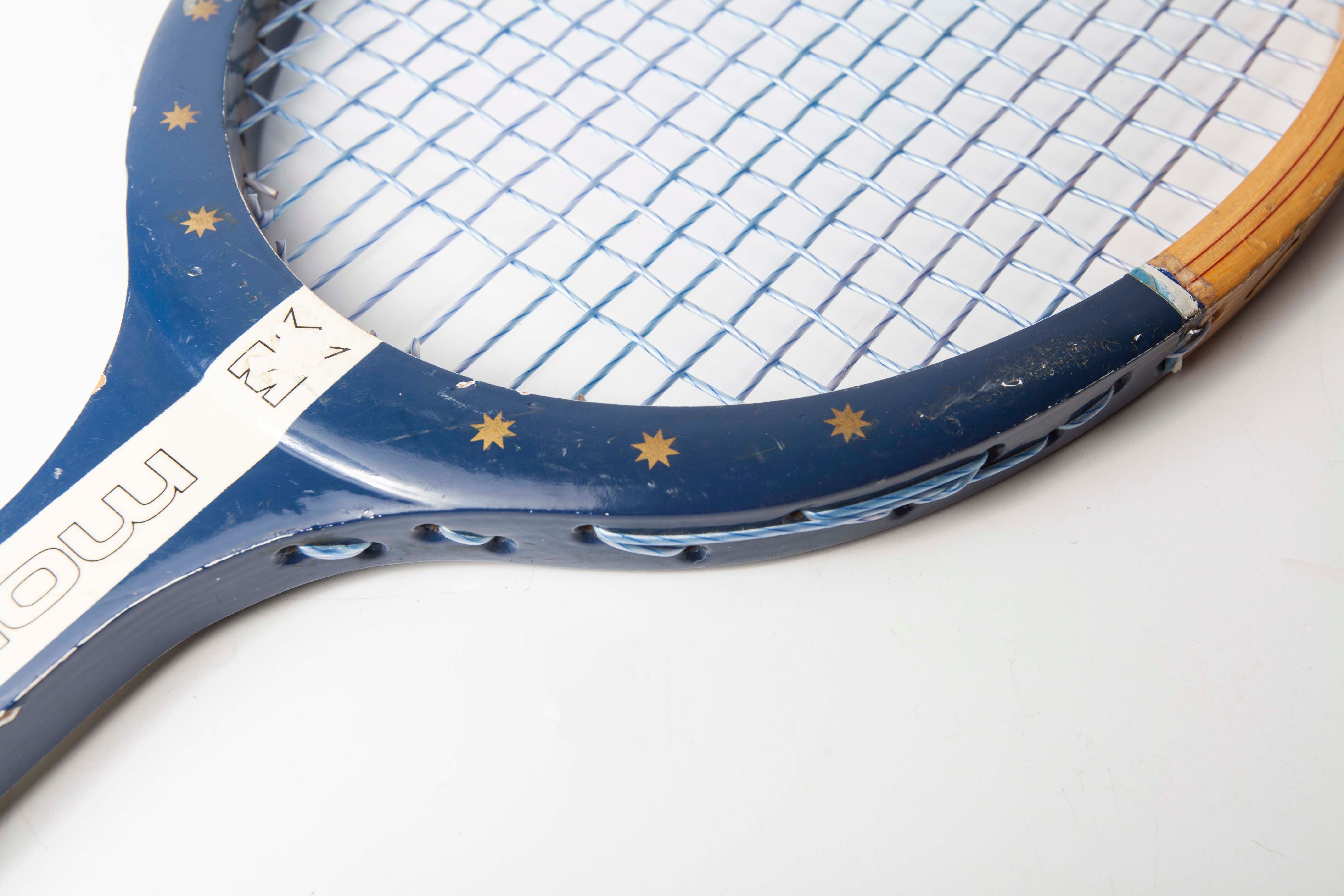 Blue Montana M505 racket with leather bag