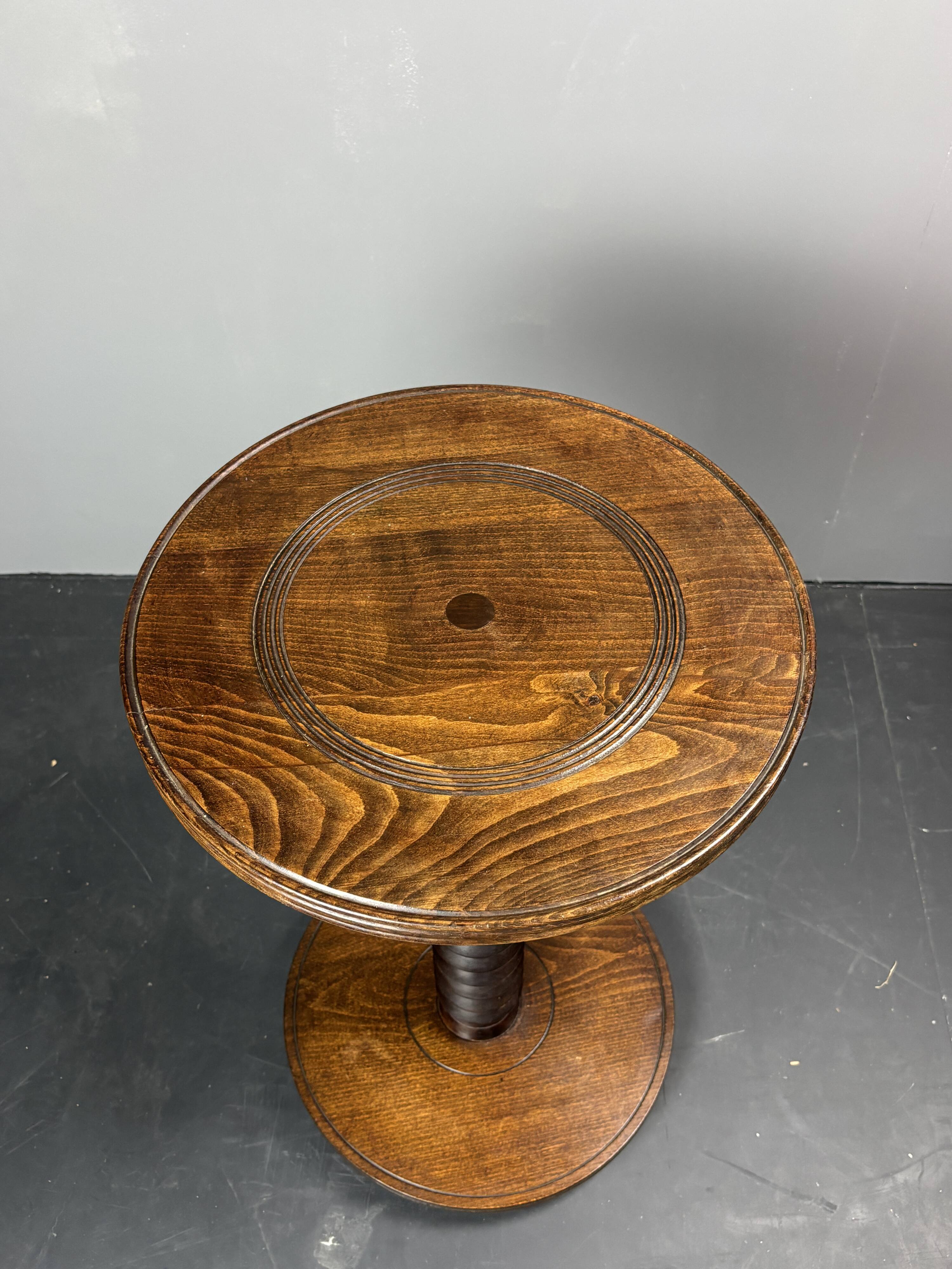 Midcentury brutalist wood turned side table in the style of Charles Dudouyt