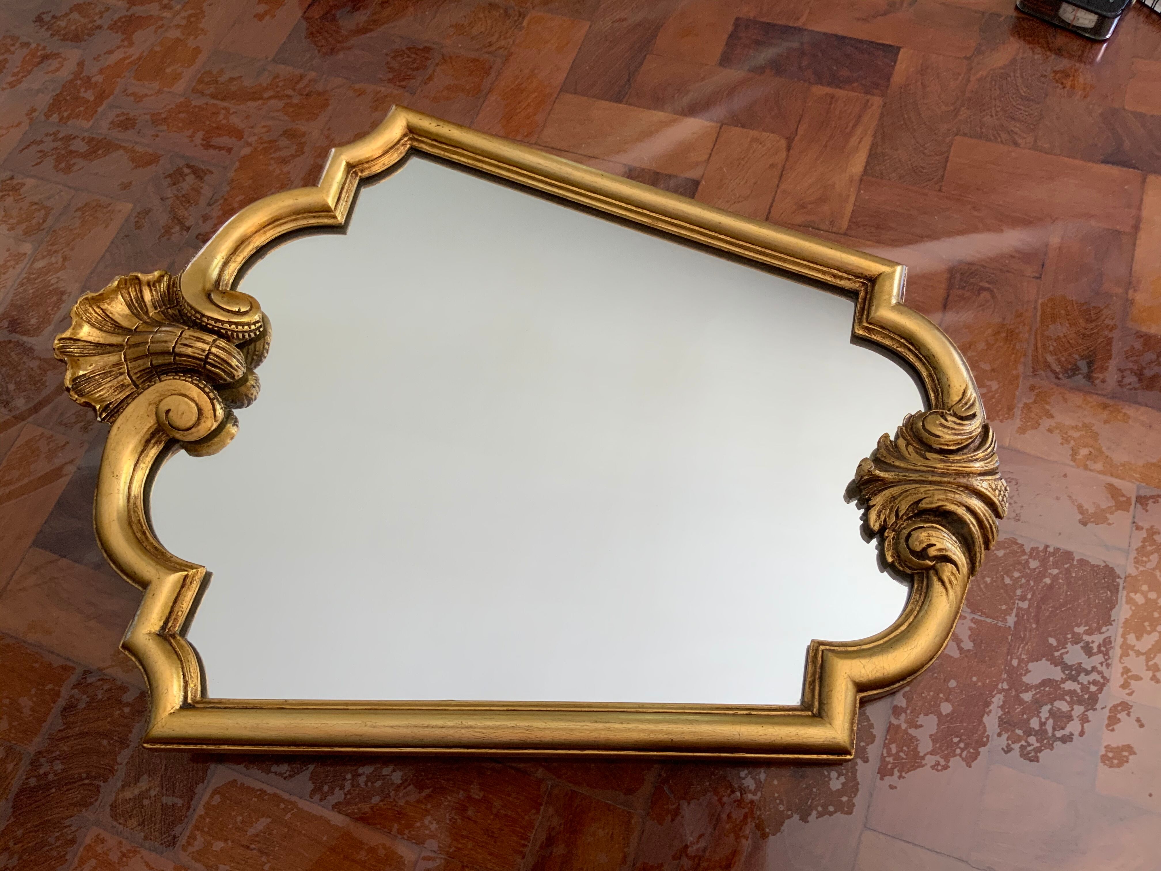 Miroir vintage en bois doré