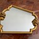 Miroir vintage en bois doré