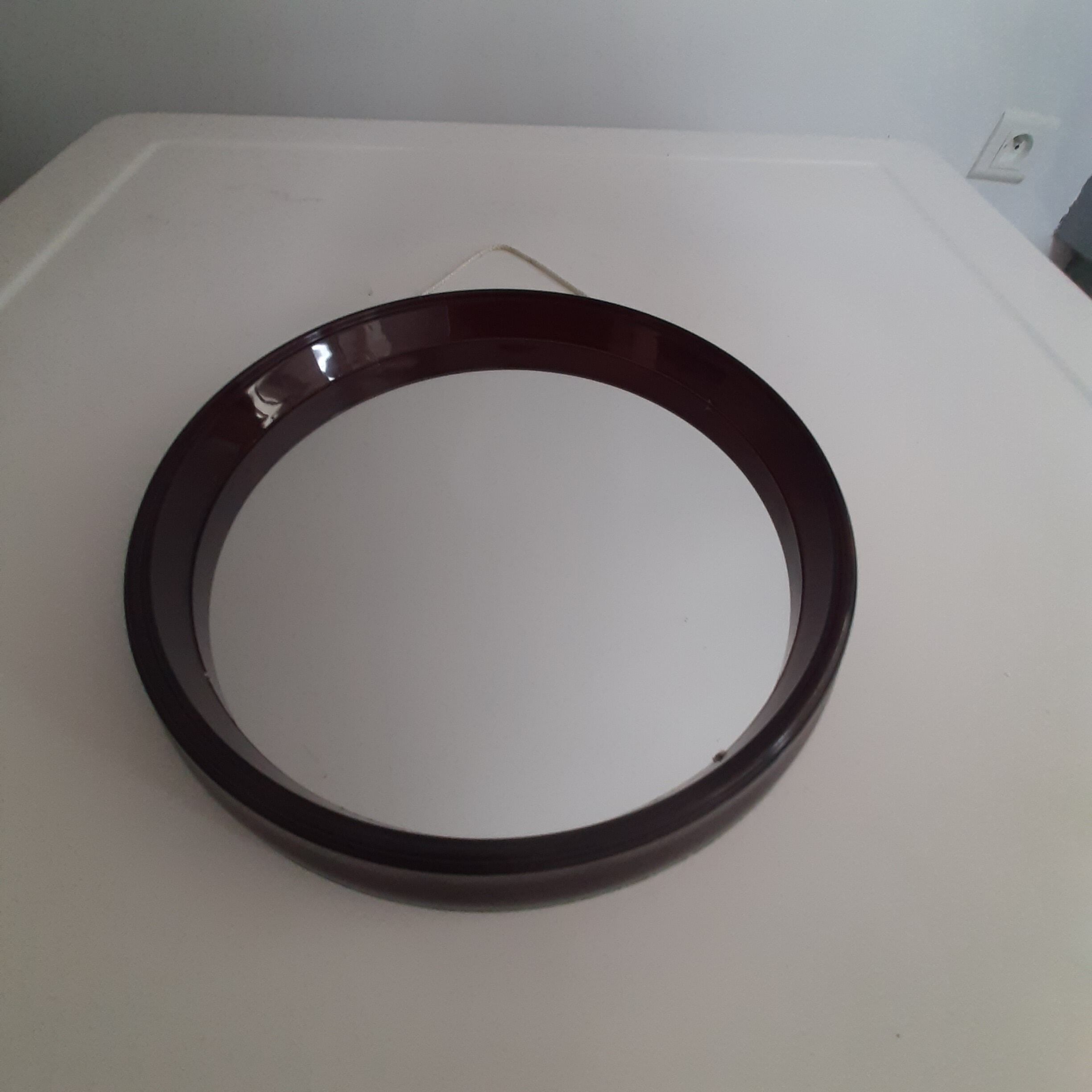round mirror in smoked plexiglass 70s