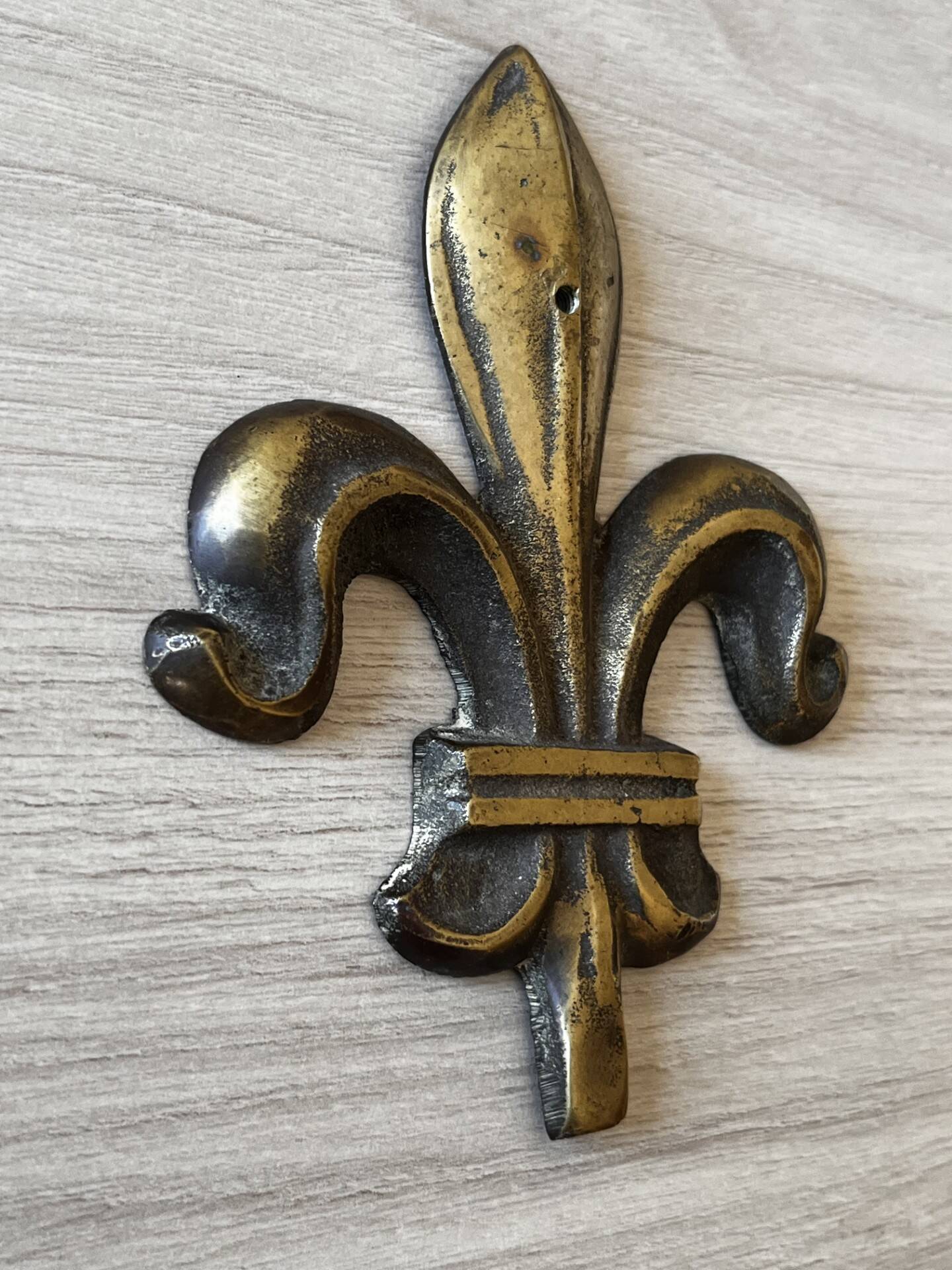 Brass fleur-de-lis