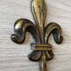 Brass fleur-de-lis