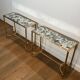 Pair of brass and antique mirror side tables from the Baguès house.