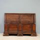 Baroque antique chest in carved walnut, Italy, 18th century.
