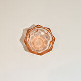 Empty pink glass jar pocket