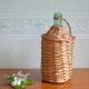 Viresa glass bottle and woven rattan