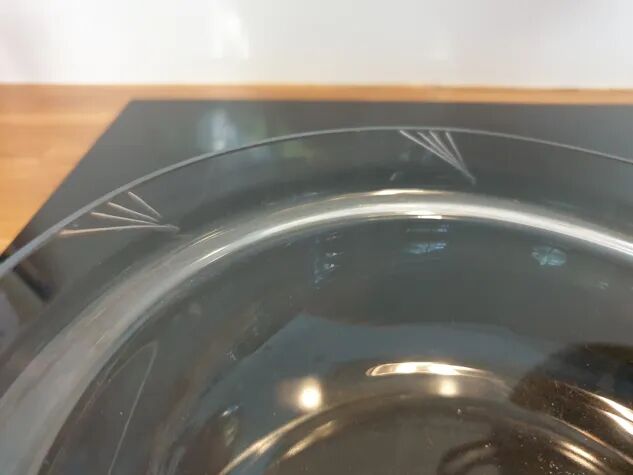 Art Deco brass cup and its engraved saucer.