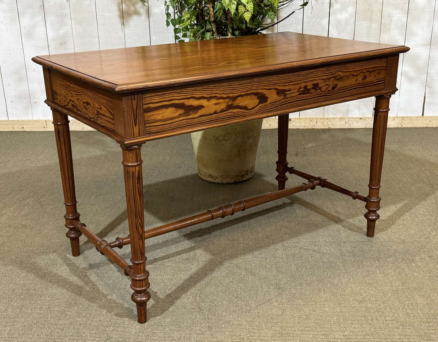 Desk table from the early 20th century in pitch pine.