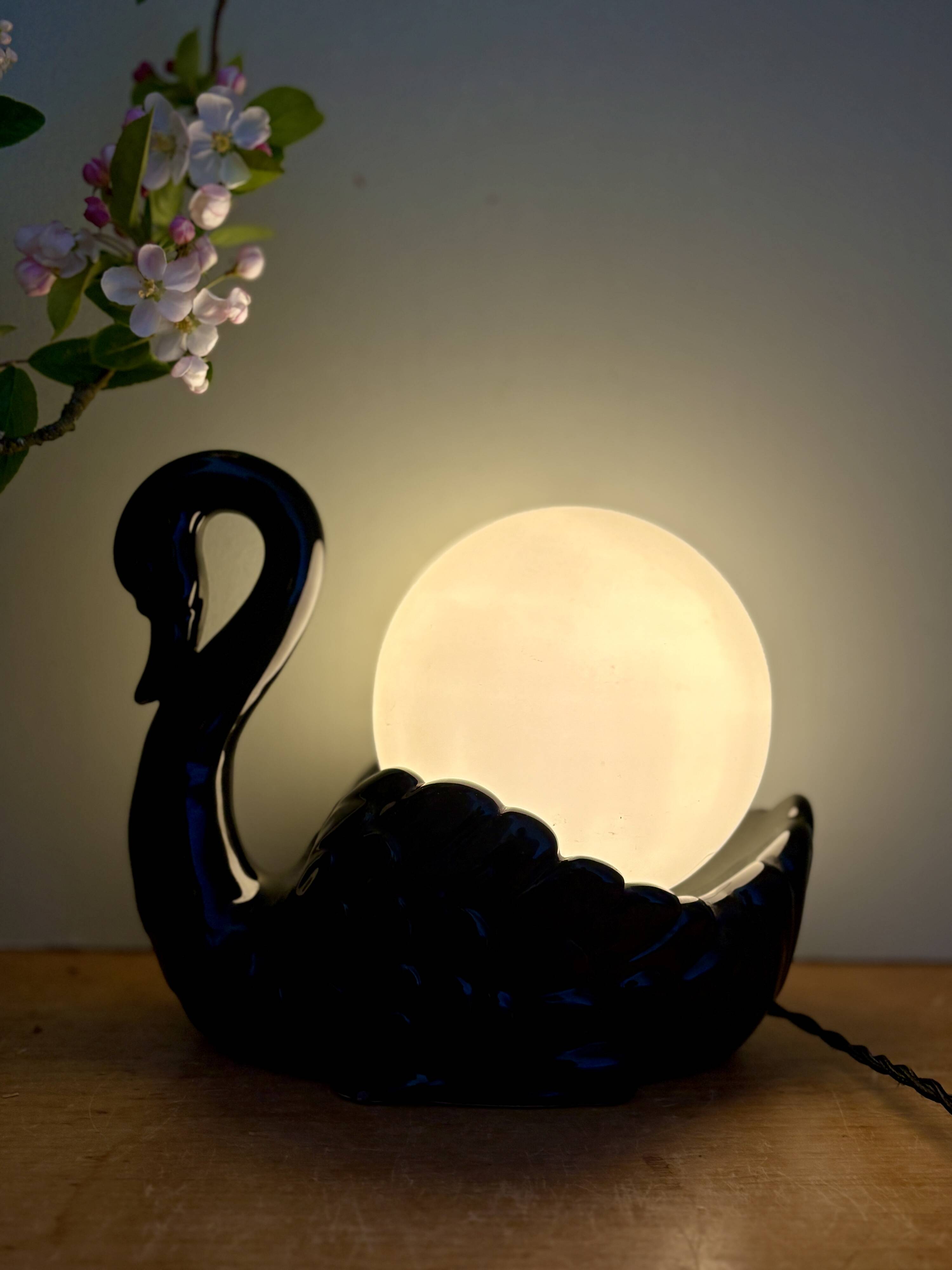 Vintage lamp, black ceramic swan and white opaline globe