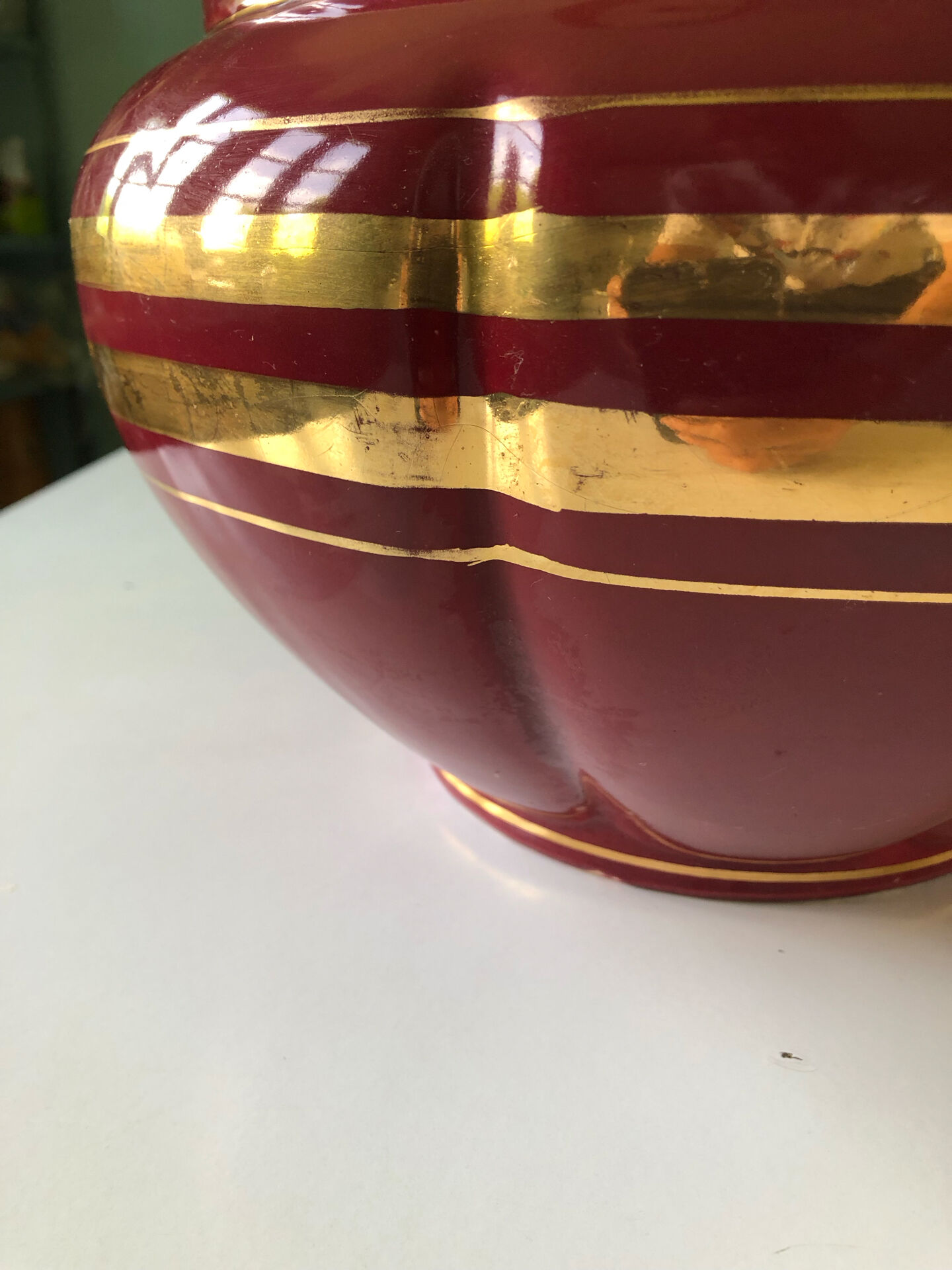 Large burgundy and gold vase