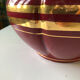 Large burgundy and gold vase