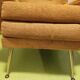 Old velvet heating chair on metal legs