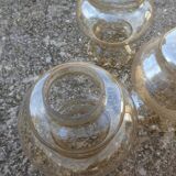Set of 6 amber glass globes.
