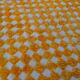 Yellow and white checkered Berber rug