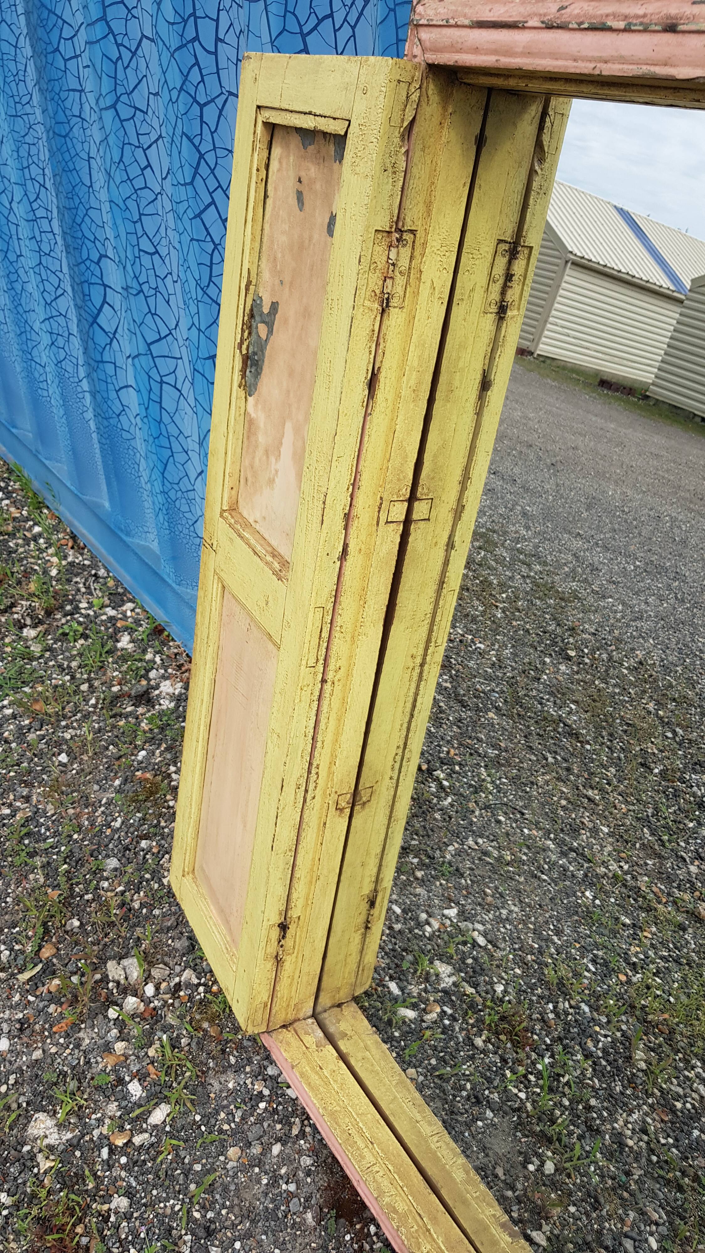 Old polychrome Burmese teak window with interior mirror.