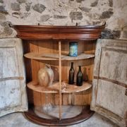 Antique demi-lune cabinet in walnut, late 18th century, French château.