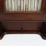 French Art Deco tall cabinet with glass door and hidden compartiment, ca. 1