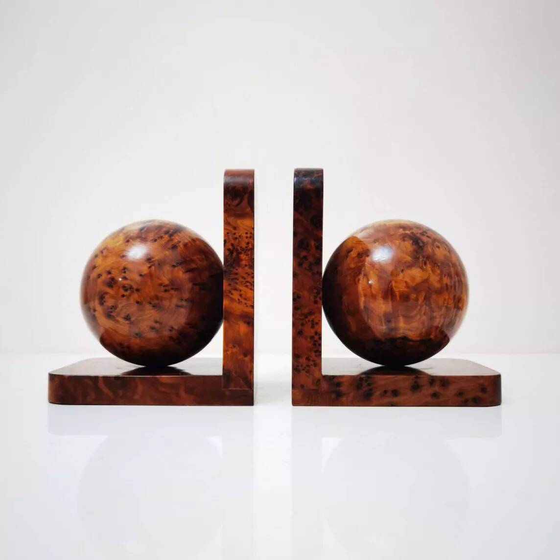Art Deco bookends in polished solid burl wood
