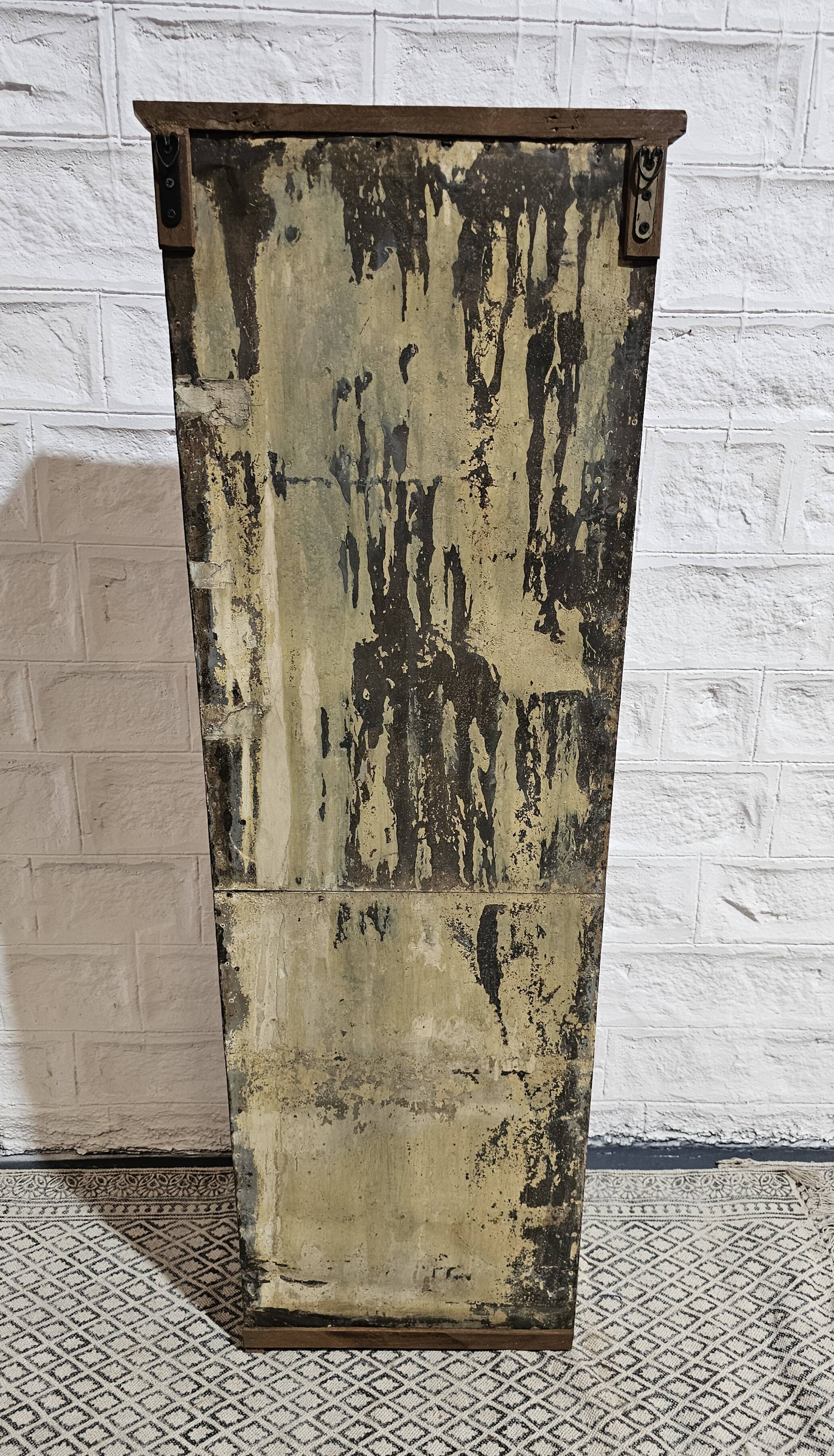 Pink showcase in Burmese teak