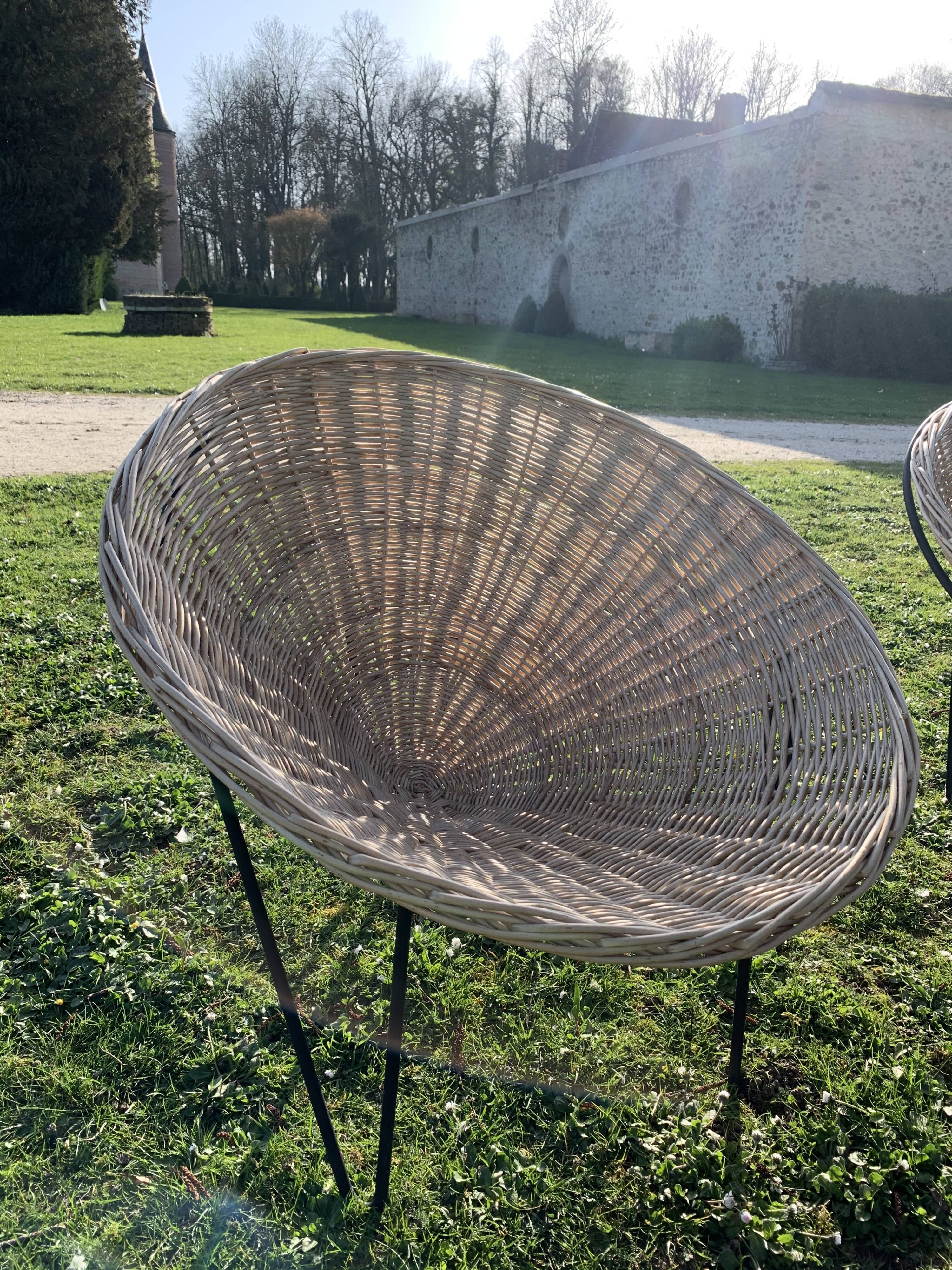 Pair of wicker "basket" armchairs