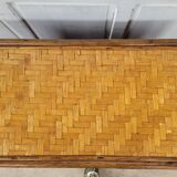 Chest of drawers made of wood, rattan and bamboo.