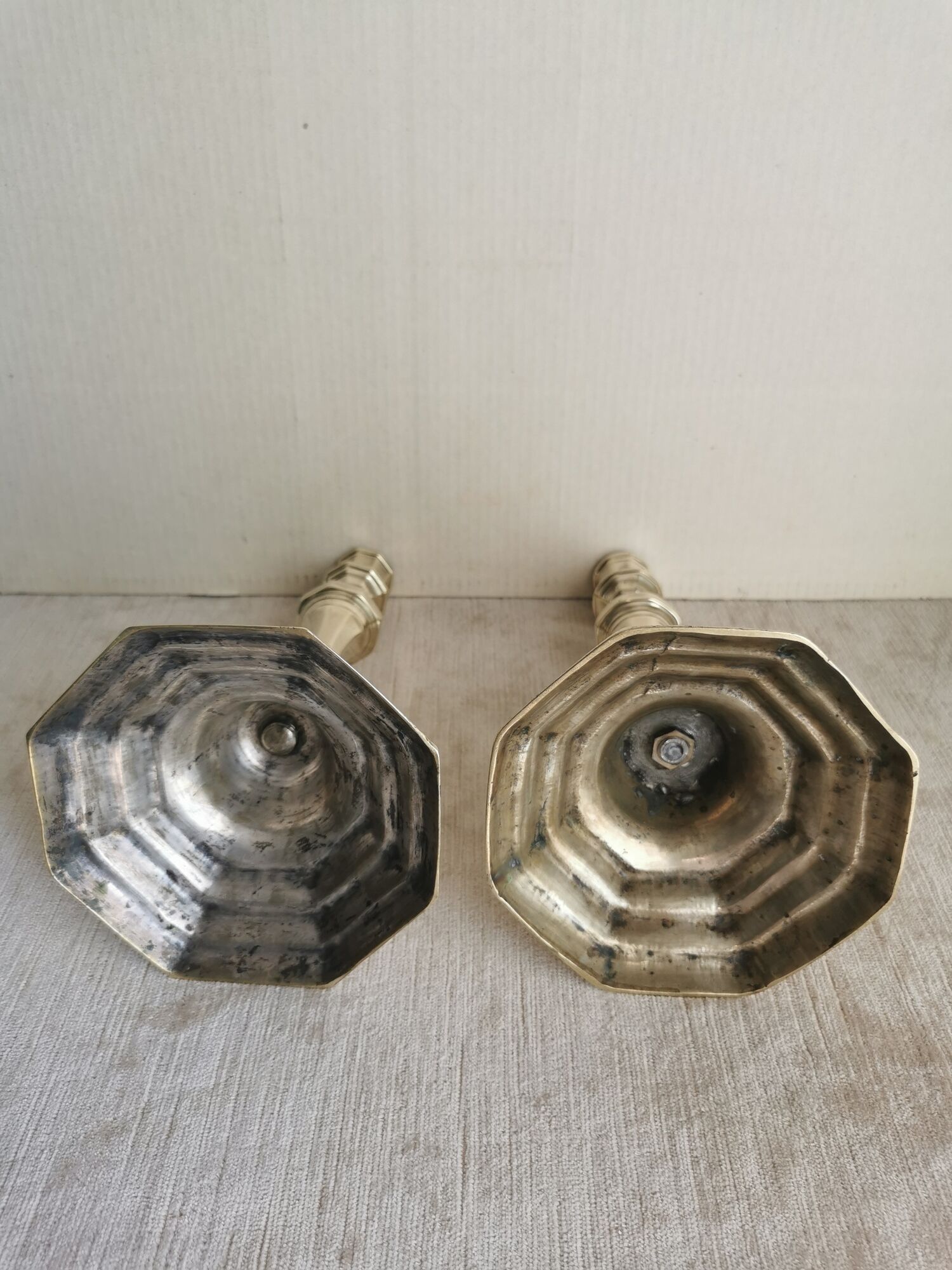 Pair of polished bronze candle holders XVIII th century