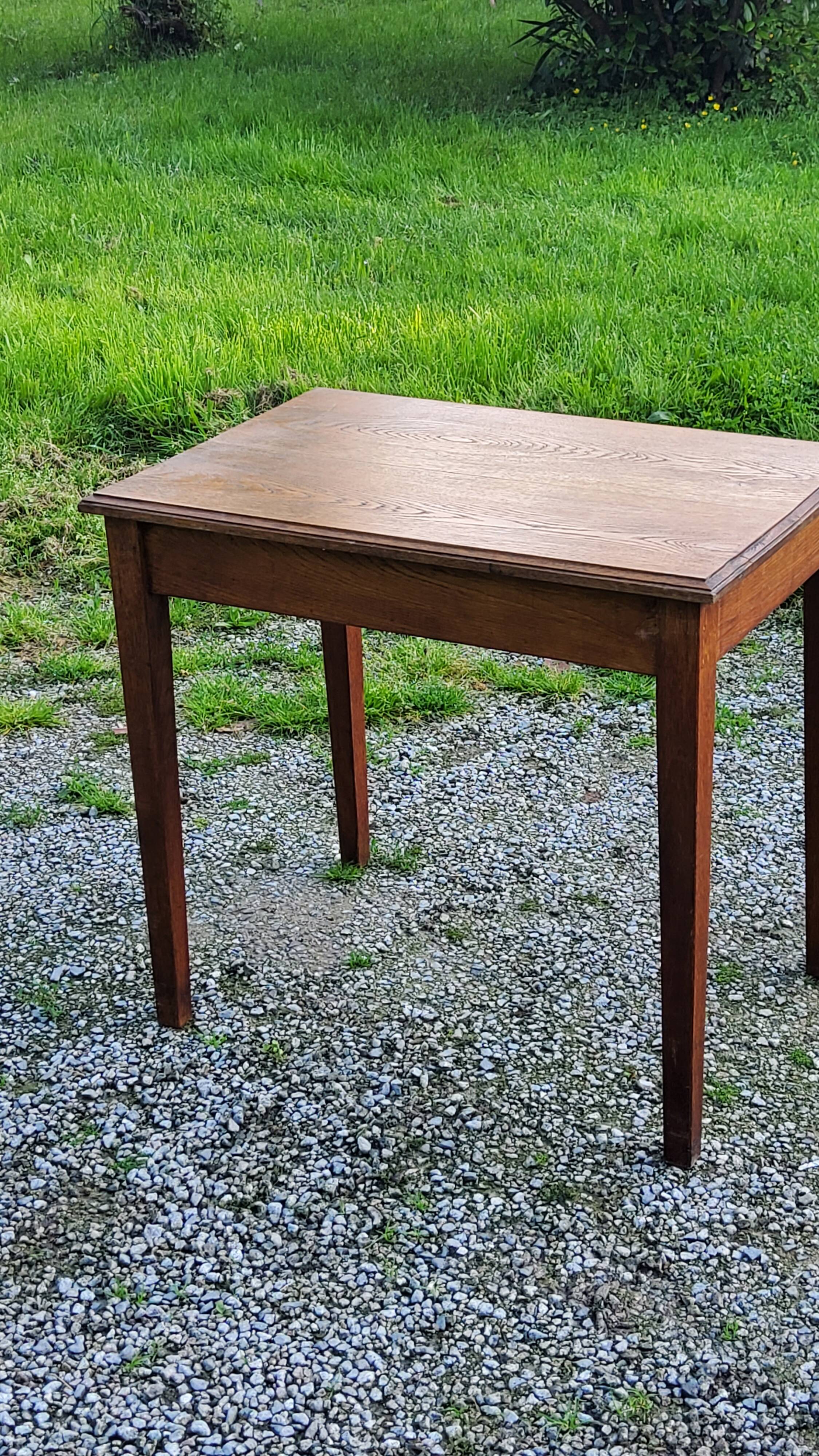 Oak writing table with spindle legs, early 20th century